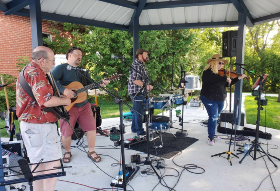 band playing outside at Keswick Parkette in Georgina