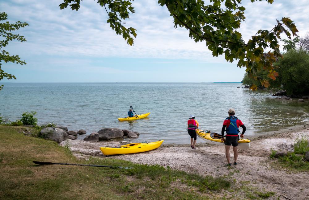 paddling on shore of Lake Simcoe