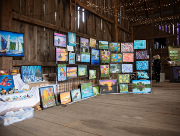 Gallery of paintings in a barn