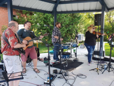 band playing outside at Keswick Parkette in Georgina
